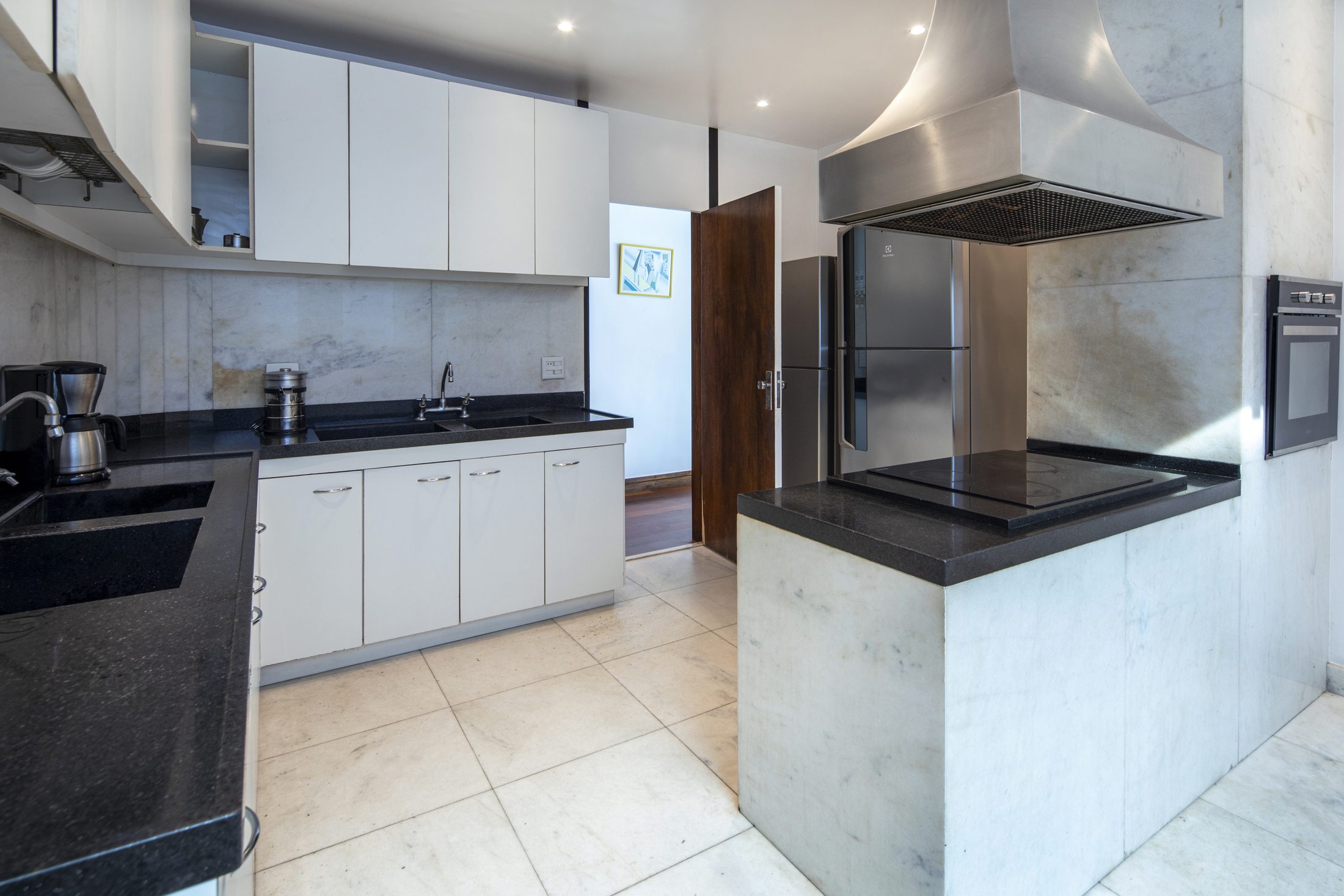 The fully equipped kitchen where a private chef prepares meals at ADV 001